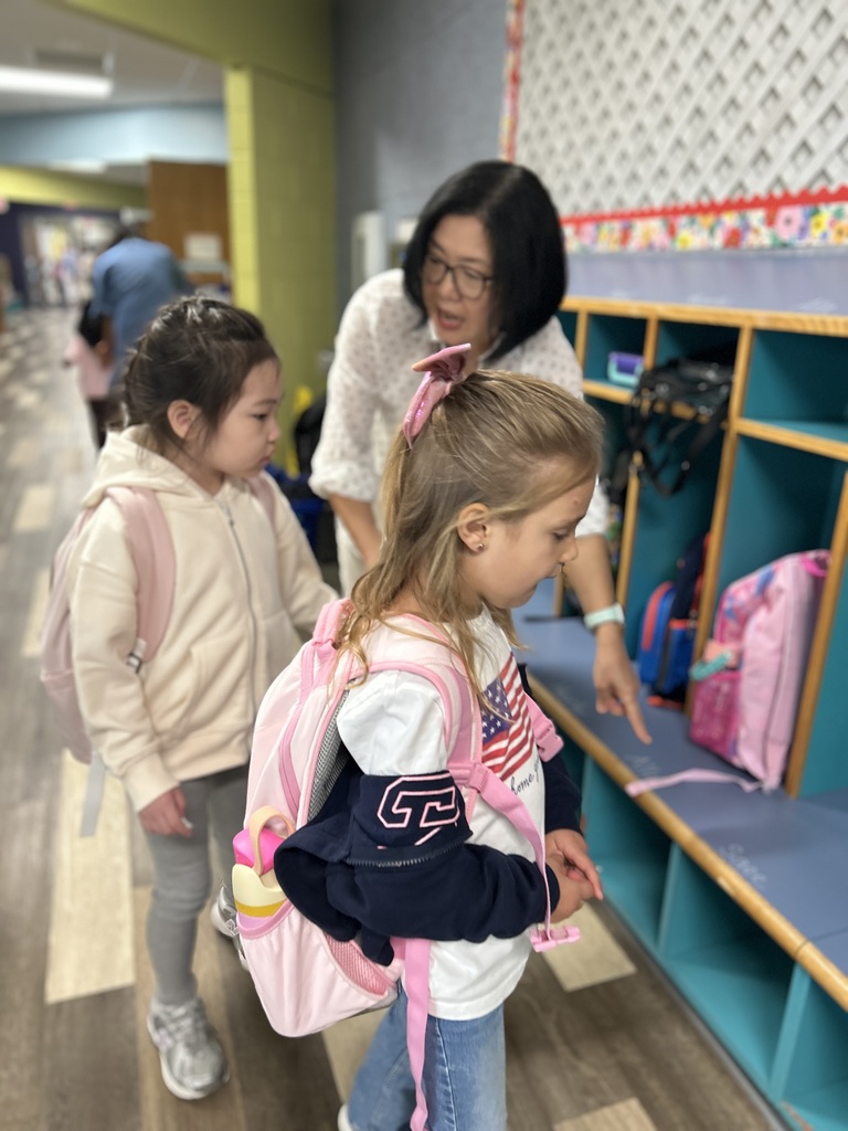 Students unpacking their bags.