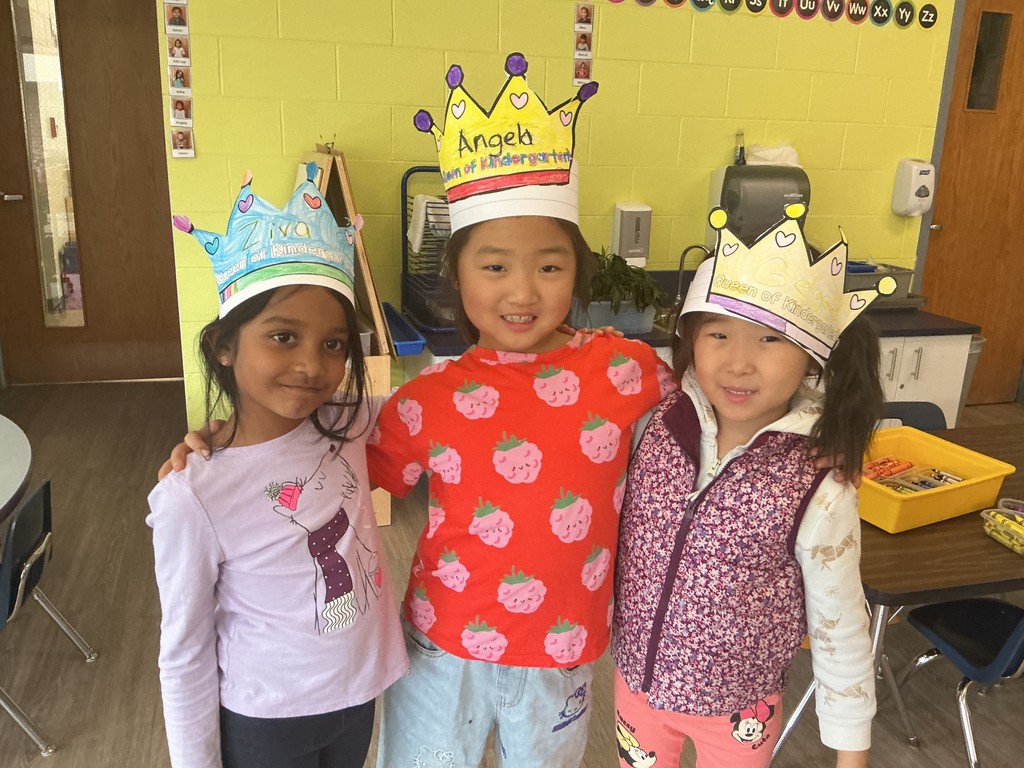 Students wearing crowns