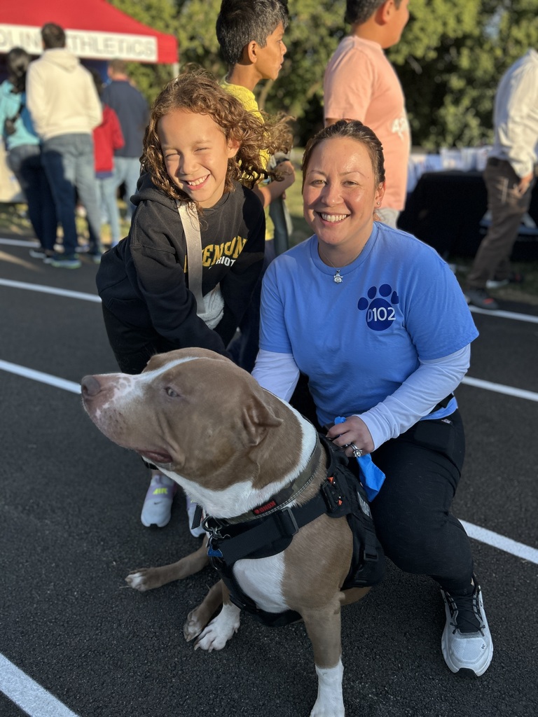 Therapy Dog with student.