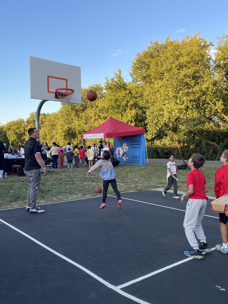 Students playing basketball.
