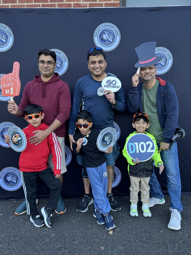 Families posing for a photo.
