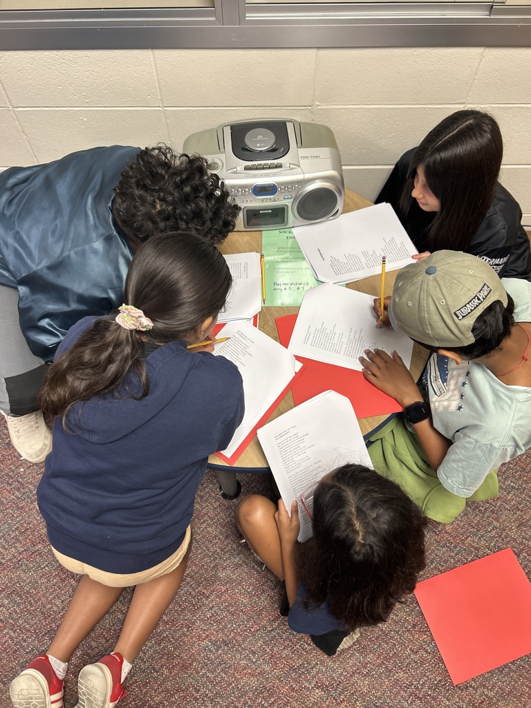 Students listening to music and reflecting.