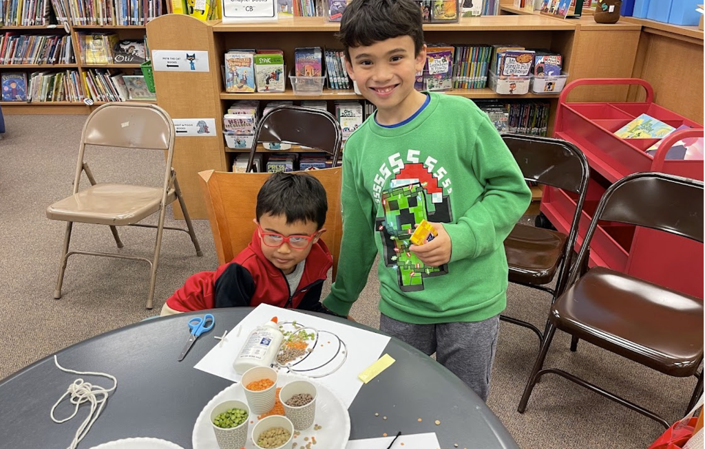 Brothers together making a craft.