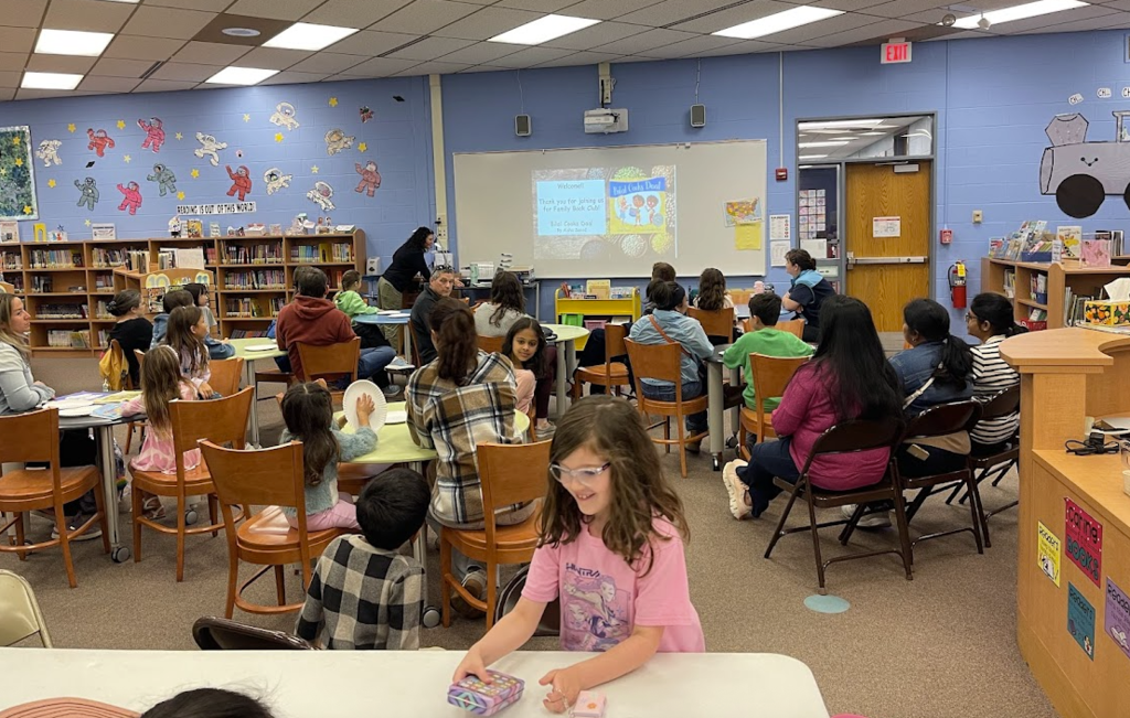 Group of students sitting in the library.