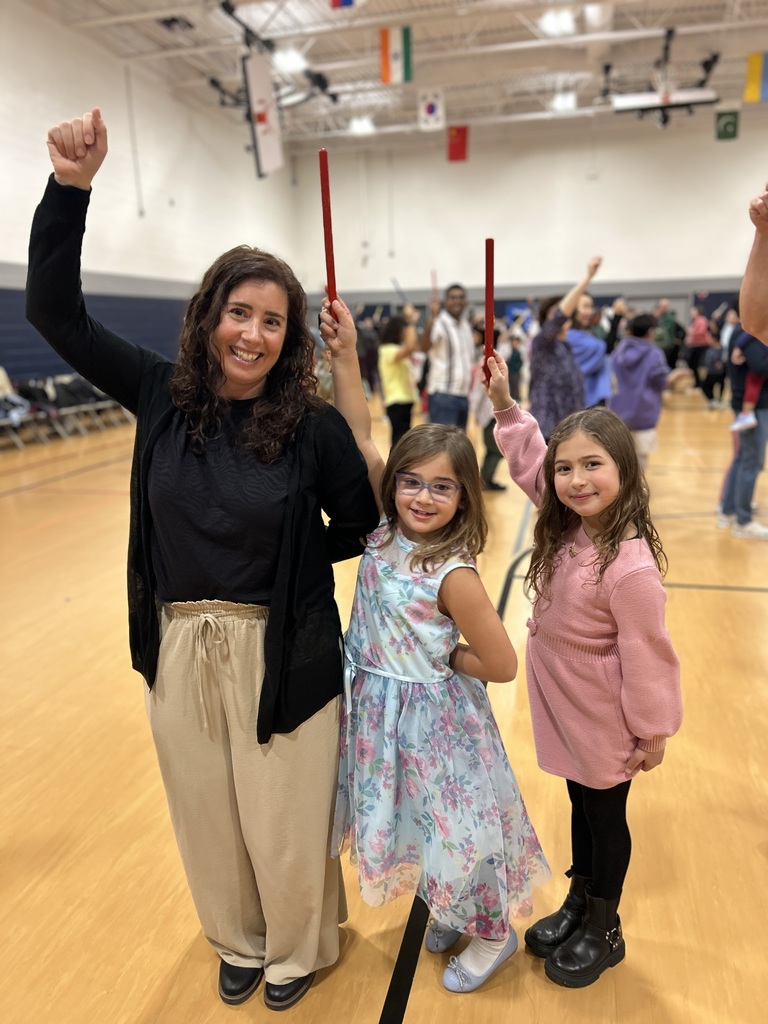 Family holding their sticks together.