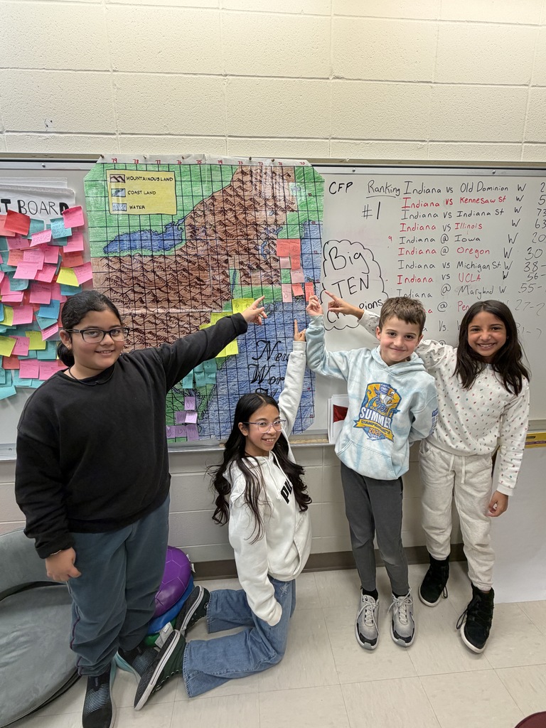 Students pointing to various colonies.