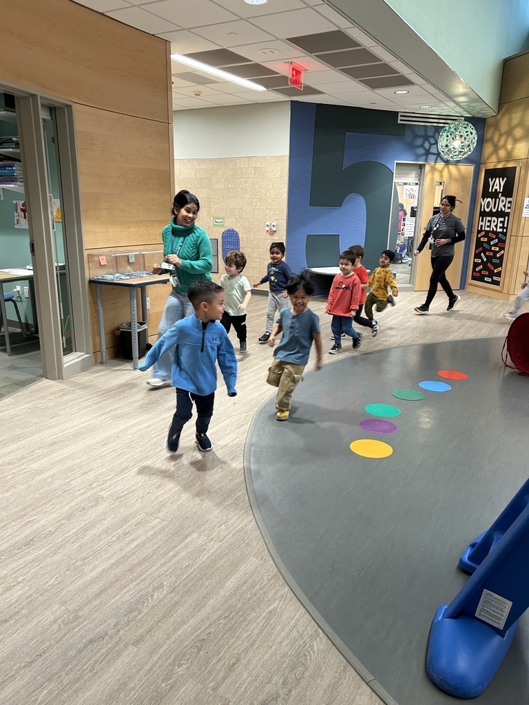 Students running in a circle. 