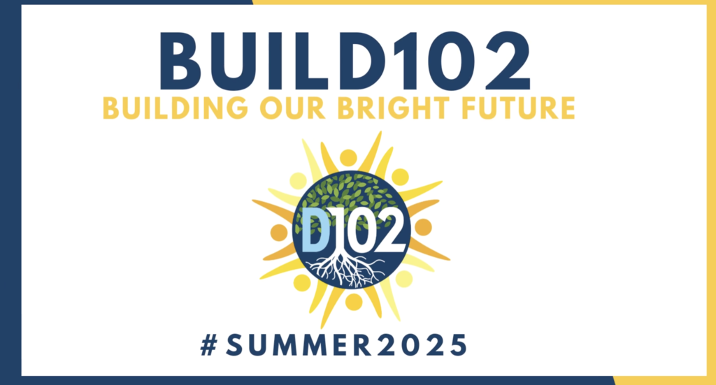 Cover photo of a video. It has a D102 logo with a sun around it and a title with a hashtag.