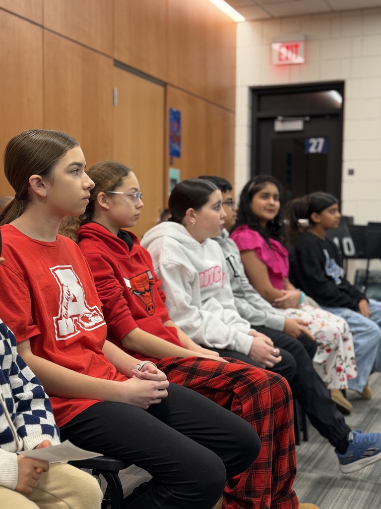 Students sitting at a special recognition.