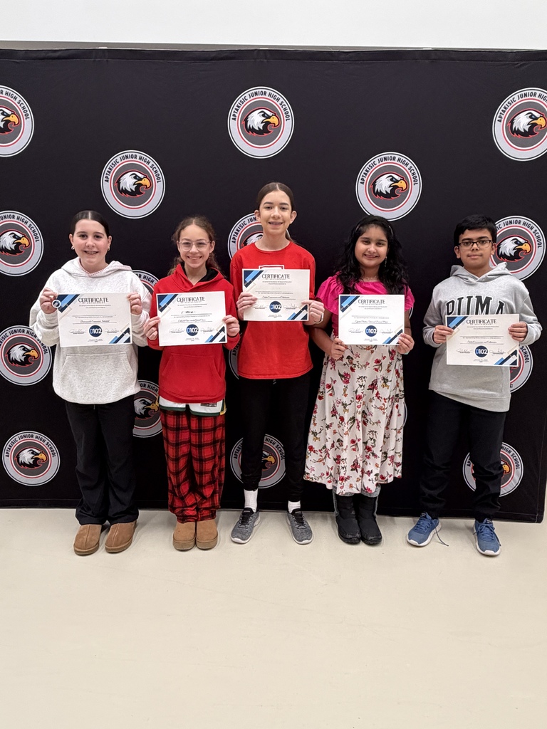 AJHS students standing with their certificates.