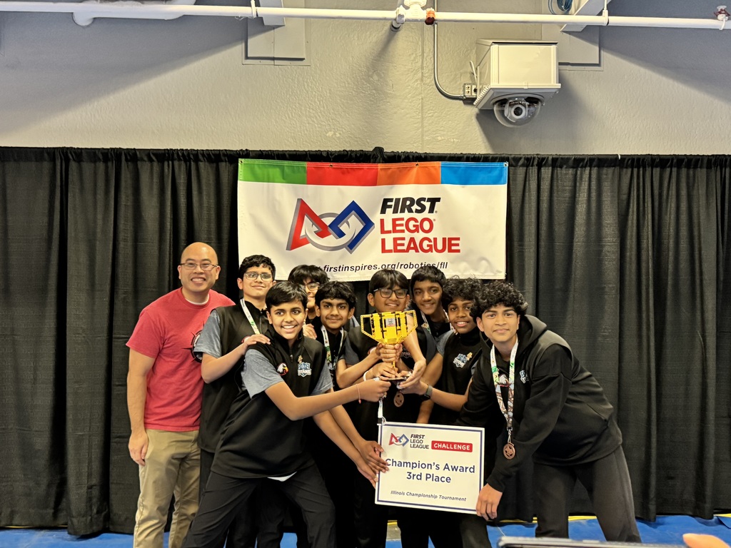 robotics team standing with Mr. Cho.