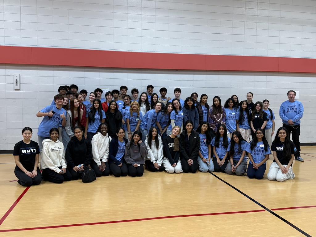 Large group of students standing in a group posing for a photo.