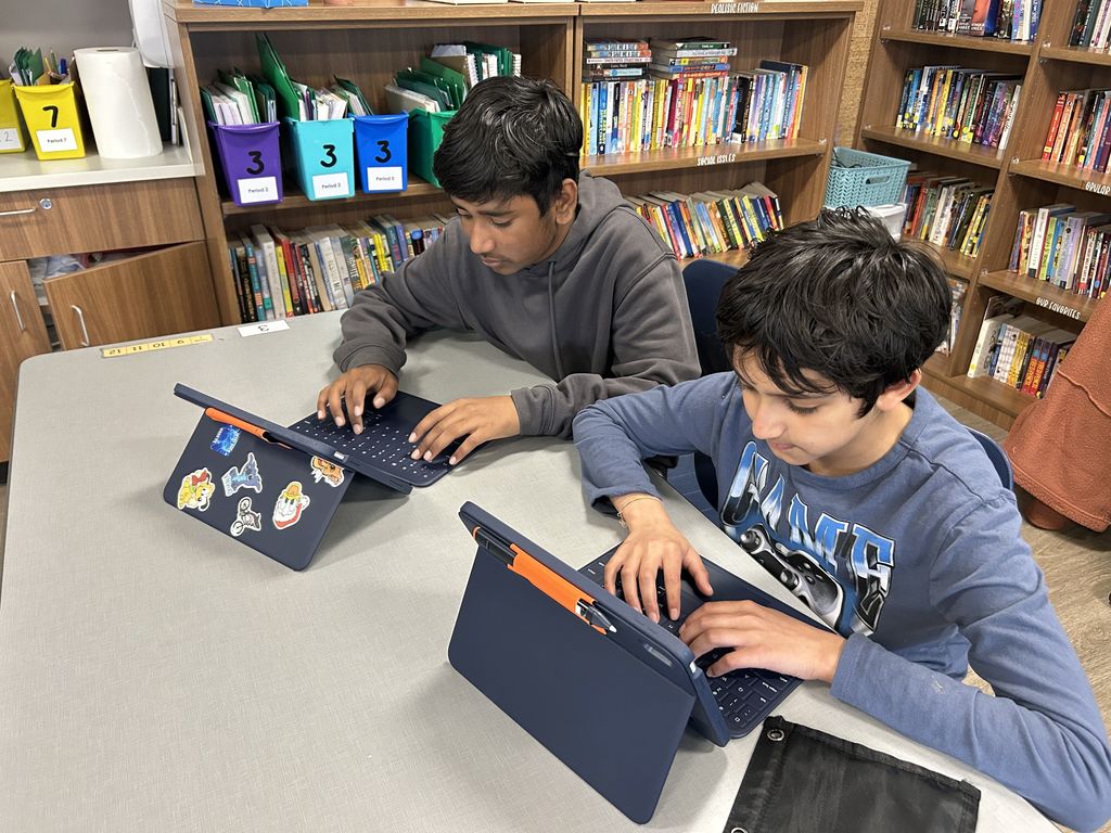 Students working on their ipads.