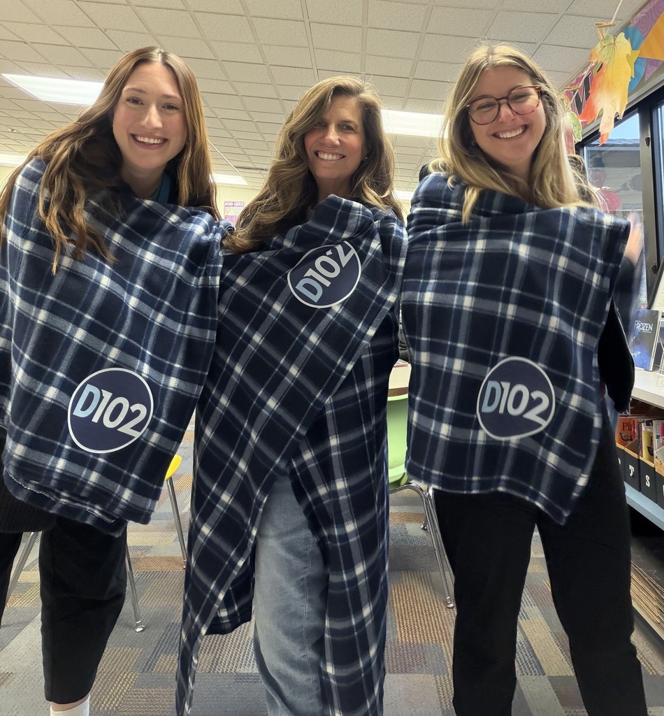 Staff wrapped in D102 blankets.