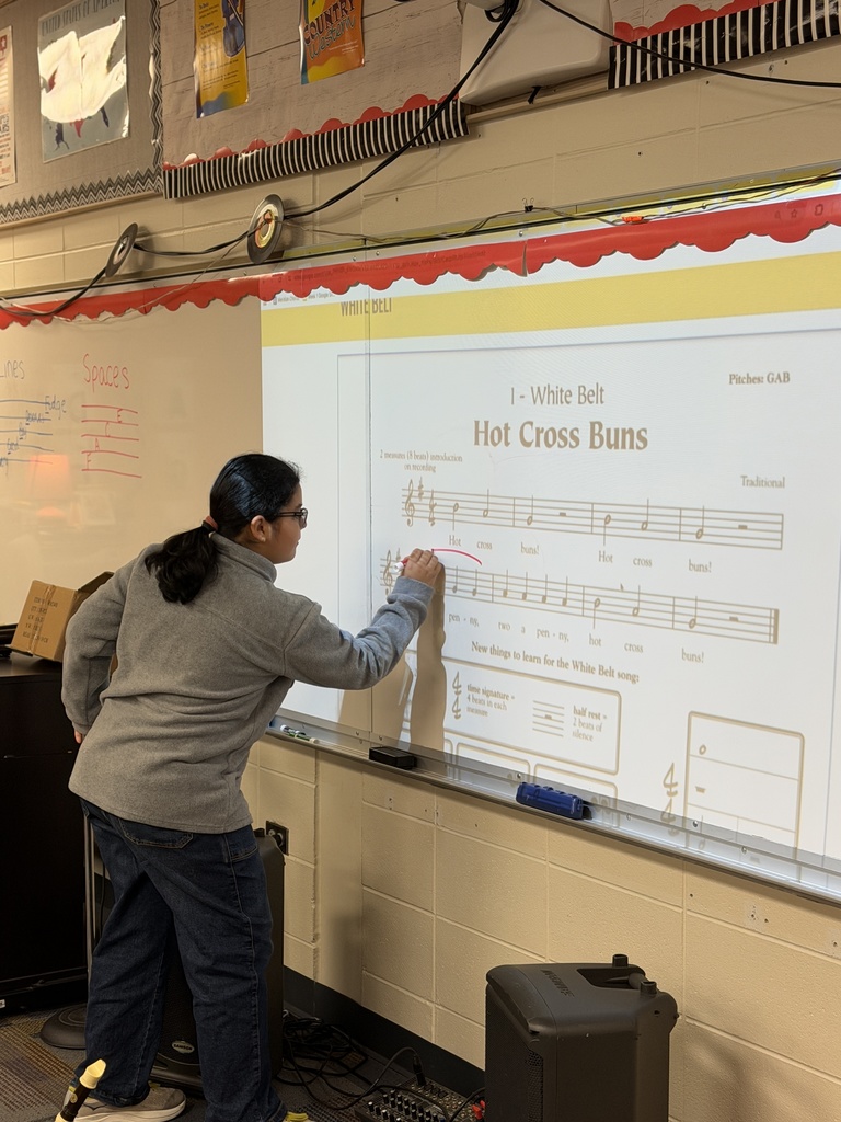 STudent circling on the board.