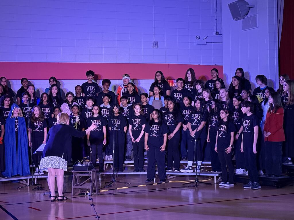 Choir singing on risers.