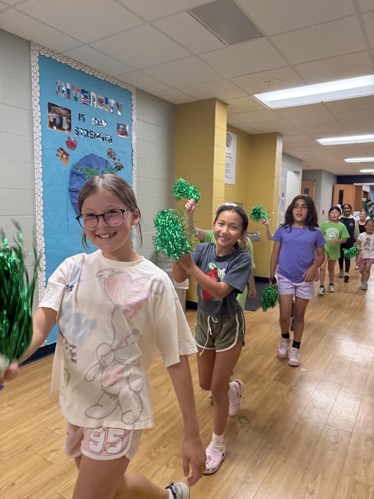 Students cheering and walking down the halls.