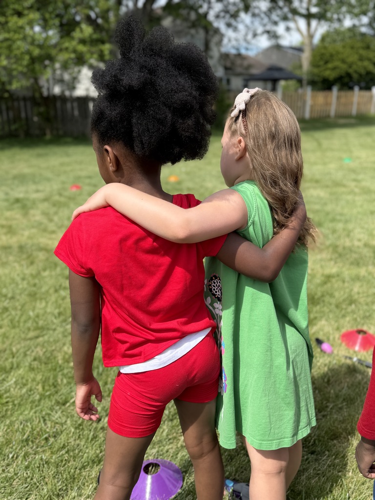 2 girls hugging.