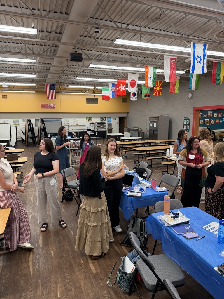 Staff mingling in the lunchroom.