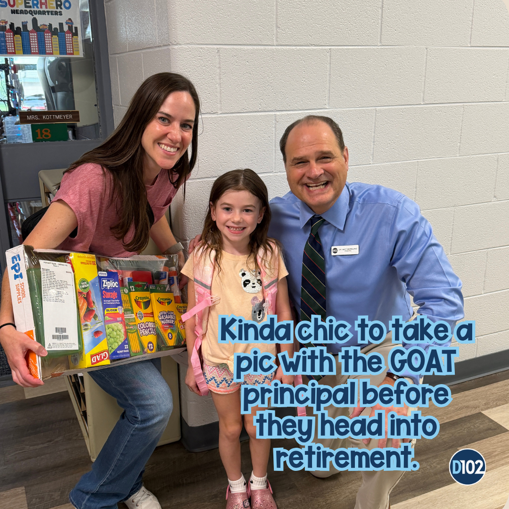 Photo of Dr. Moreland with a mom and student