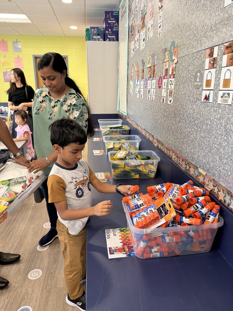 Student organzing his supplies