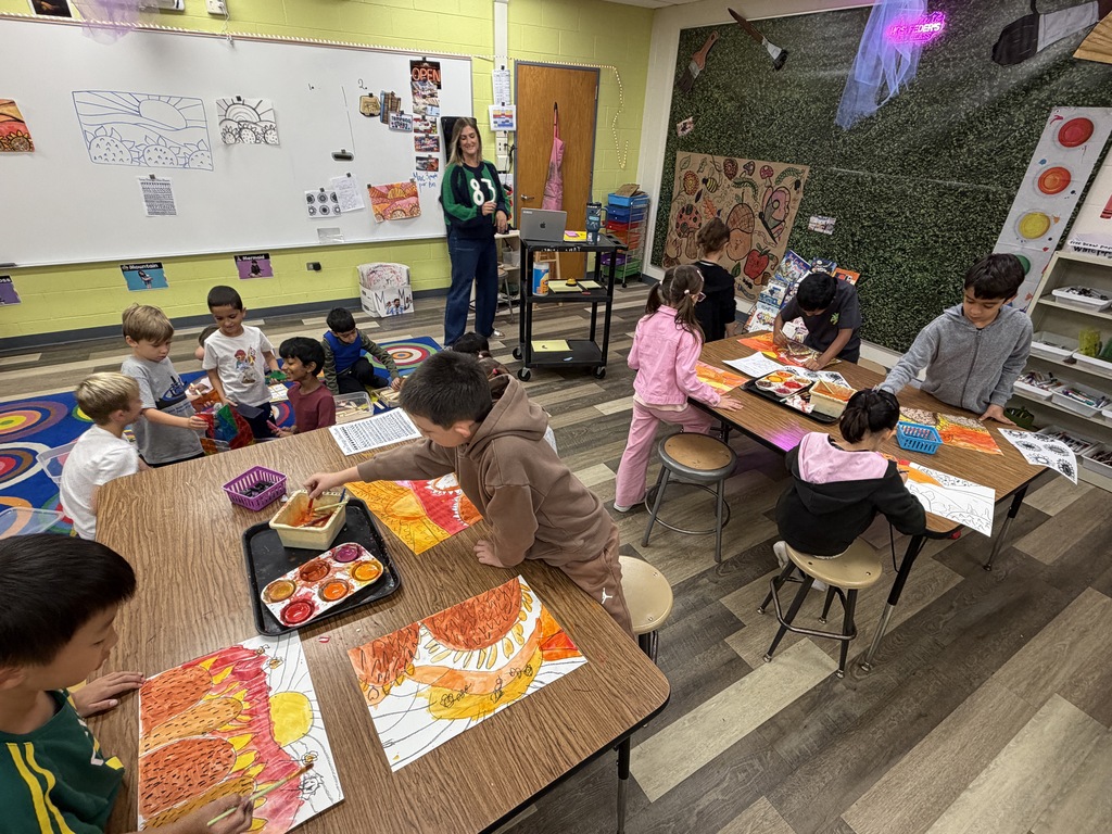 Mrs. Feder's classroom with students painting.