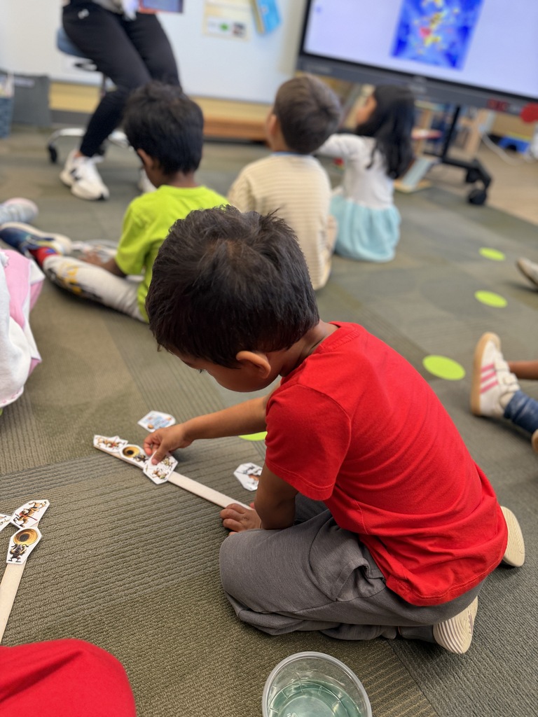 Student working on his story stick.