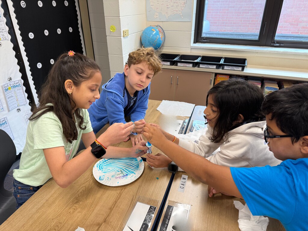 STudents trying to get toothpaste back in the container.