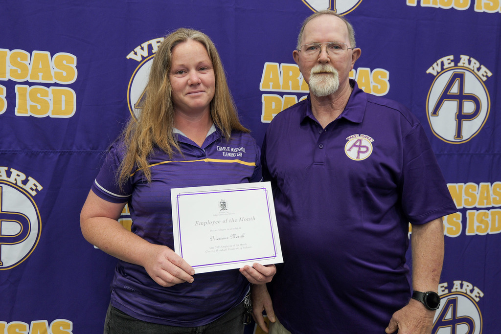 staff member receiving an award