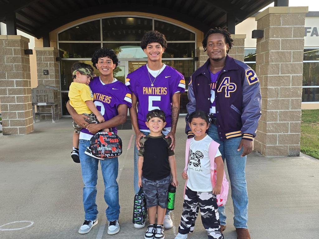 Friday morning drop-off with football players.