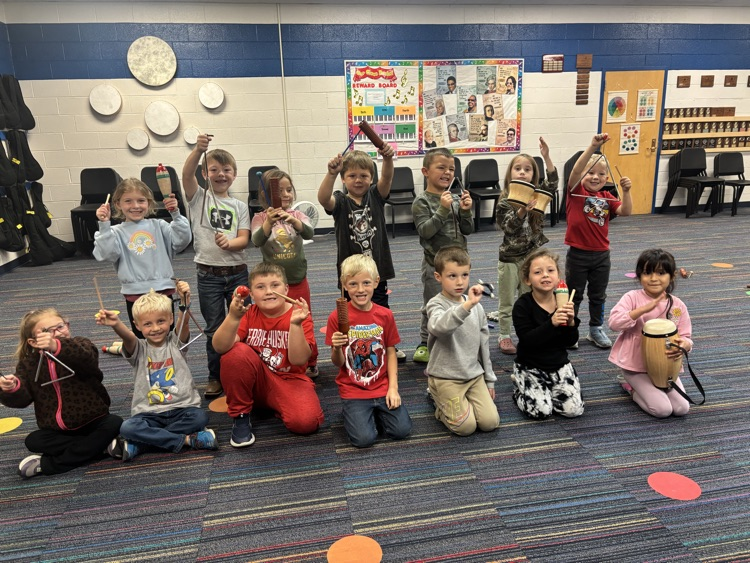 children holding instruments