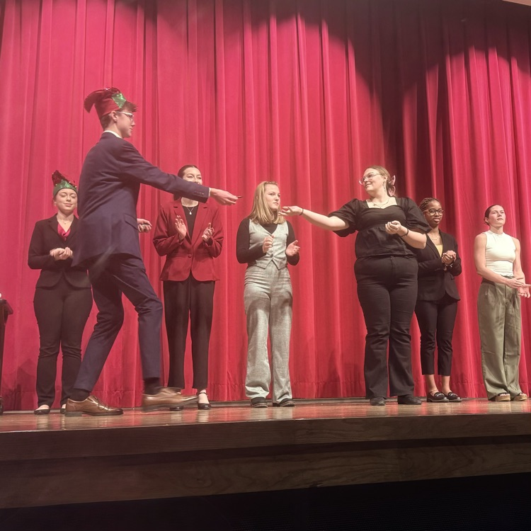 student getting award on stage