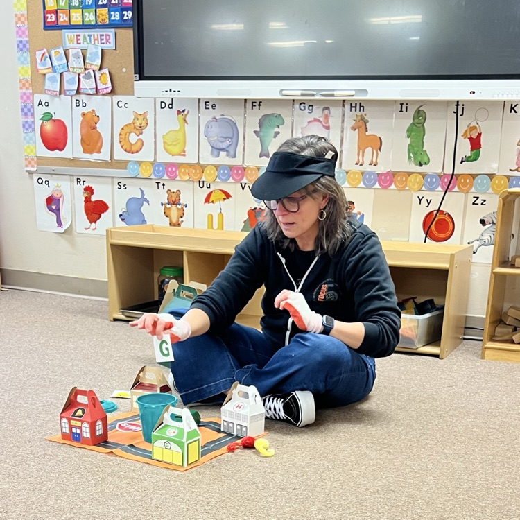 professional educator telling a story with props.