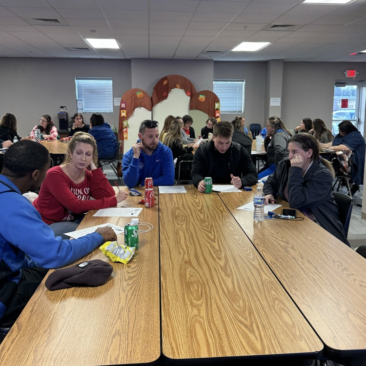 Groups of teachers discussing student engagement  