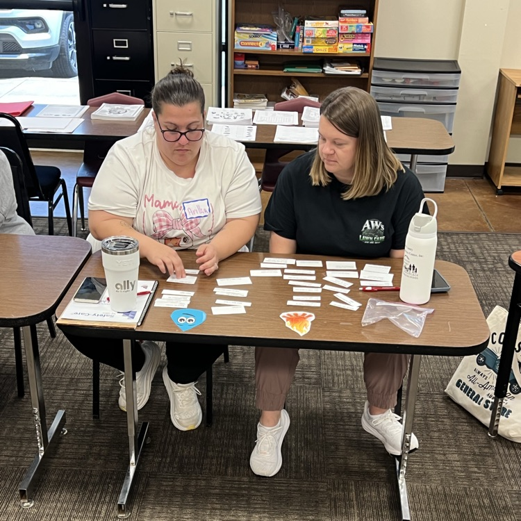     Educators participate in a hands on professional development activity focused on early childhood learning.