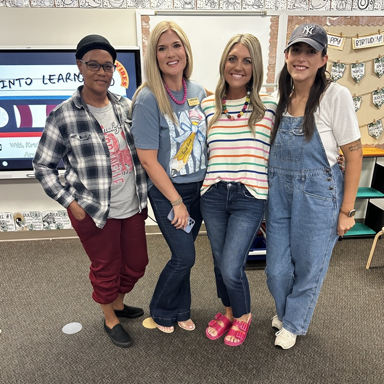 early childhood educators pose with arch ford specialist after a professional development at their school  
