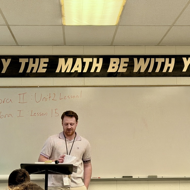 teacher at front of the class 