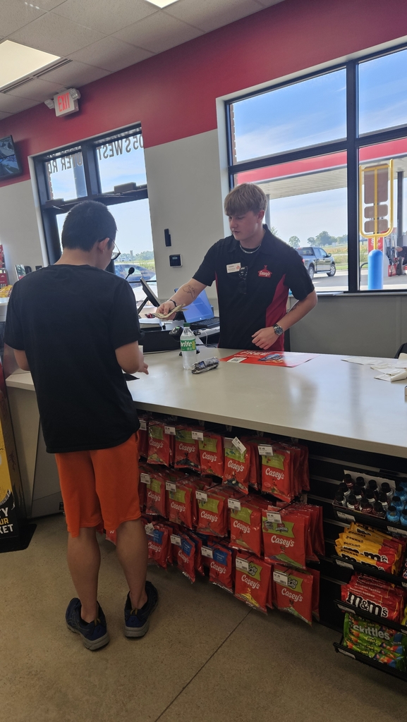 Levi paying for his snacks