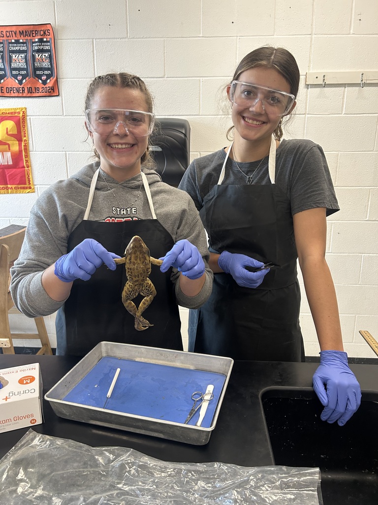 Madison and Jenna with their frog Bucket.