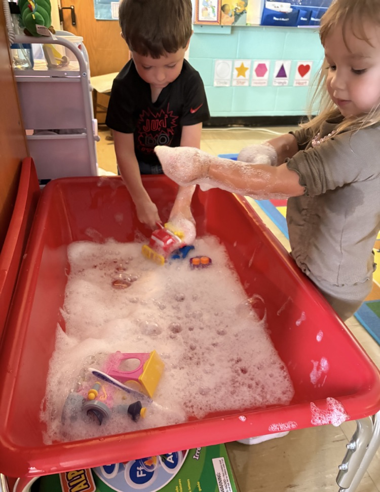 sensory table with water and bubbles
