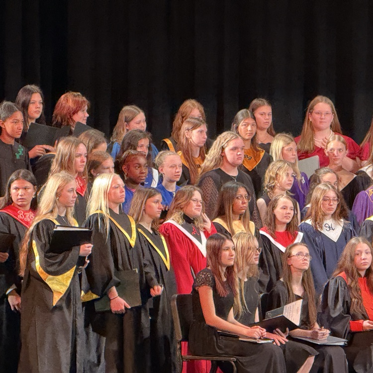 Singers on stage ready to perform 