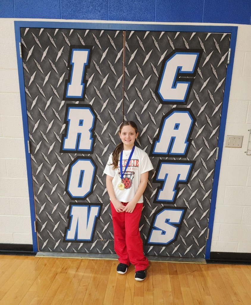Amora with her medal