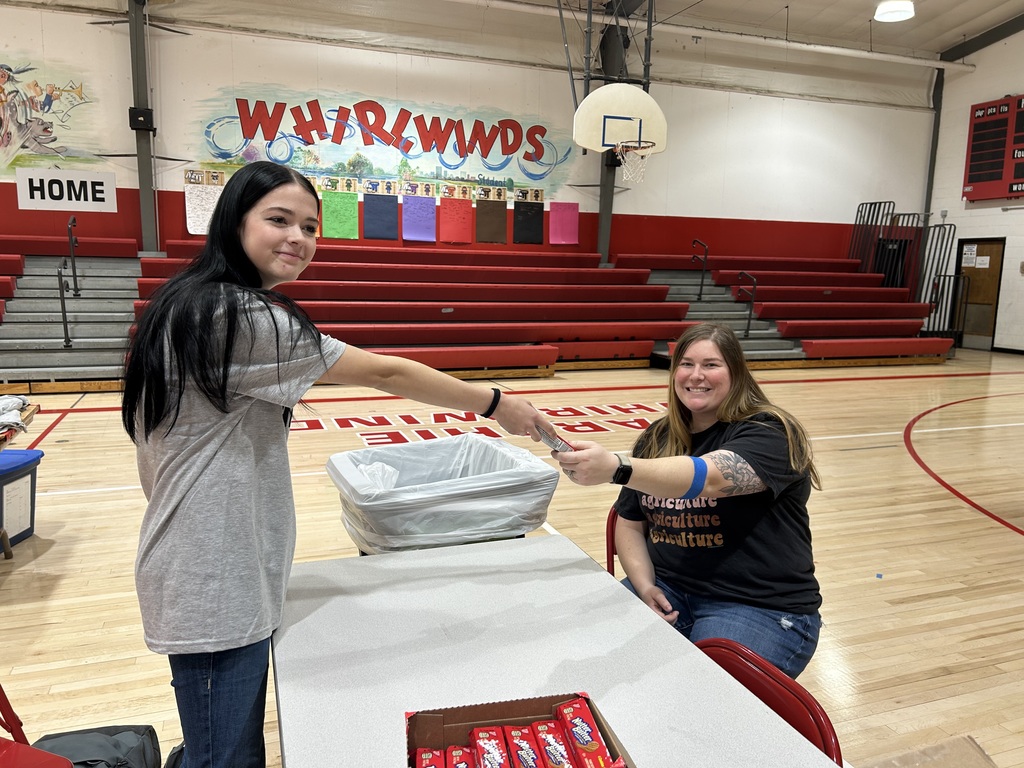 Giving a donor their snack.