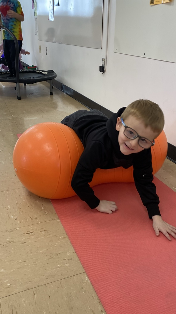 tummy roll on a peanut ball 