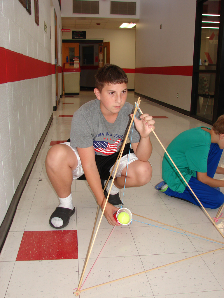 Testing a catapult and tennis ball