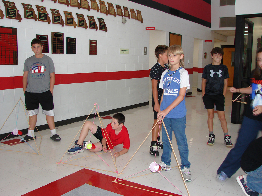 Junior high students test catapults.