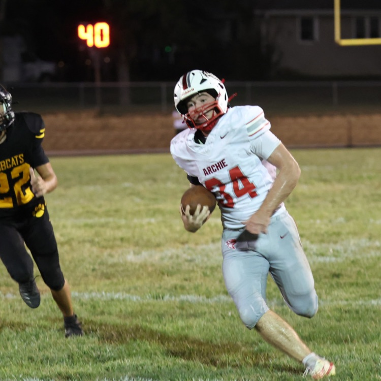 carrying football  