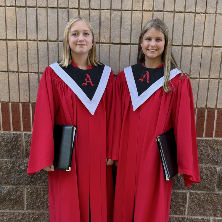 Kailee and Avery ready for the concert in their Archie choir robes