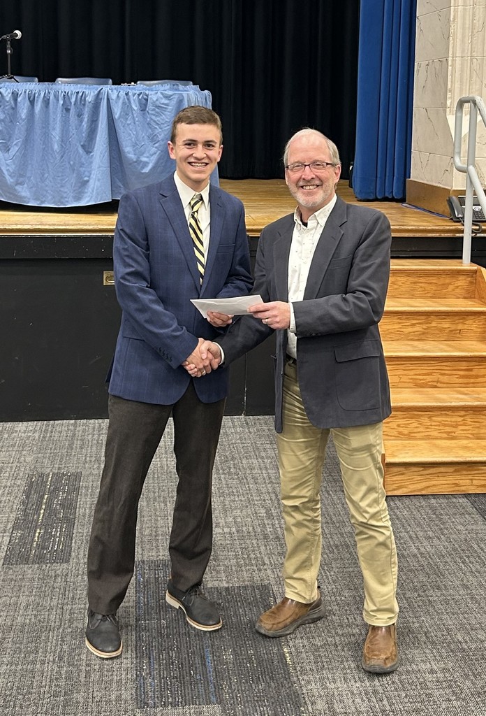 student receiving an award