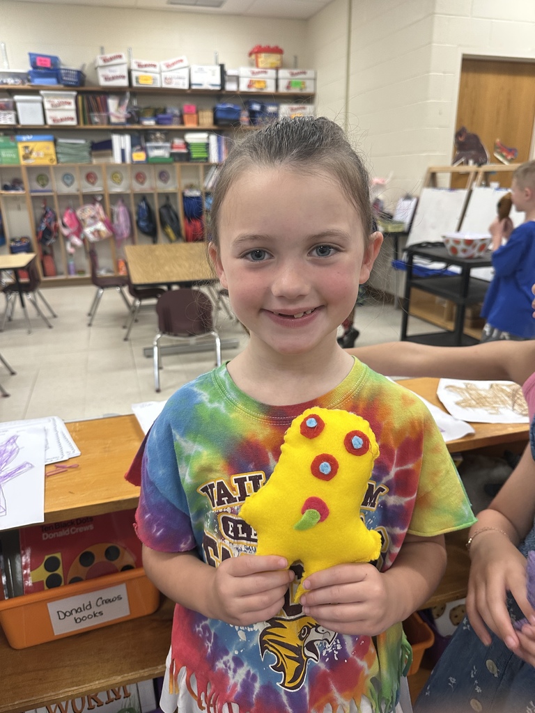 Vail kindergarten student with the finished "monster"